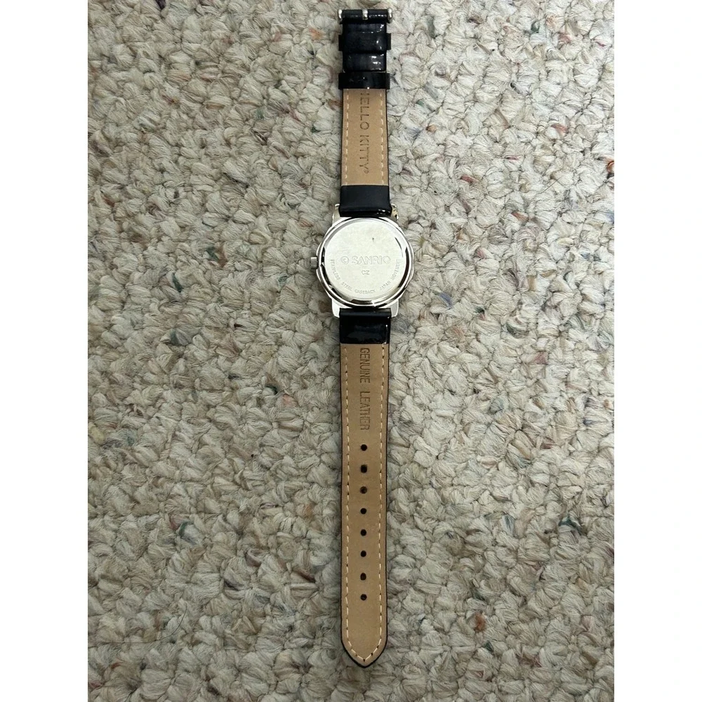 Hello Kitty Women's Watch Silver Tone Rhinestone Bezel‎ Black Band